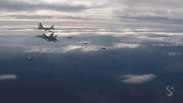 A pair of American B-52 Stratofortress nuclear-capable bombers have taken part in a mission over Europe with three other NATO allies, footage released today has shown (pictured), in a show of strength from the western military alliance.