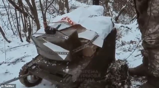 Footage has emerged of Ukrainian troops using remote-controlled 'kamikaze' cars (pictured) packed with explosives to obliterate Russian tanks