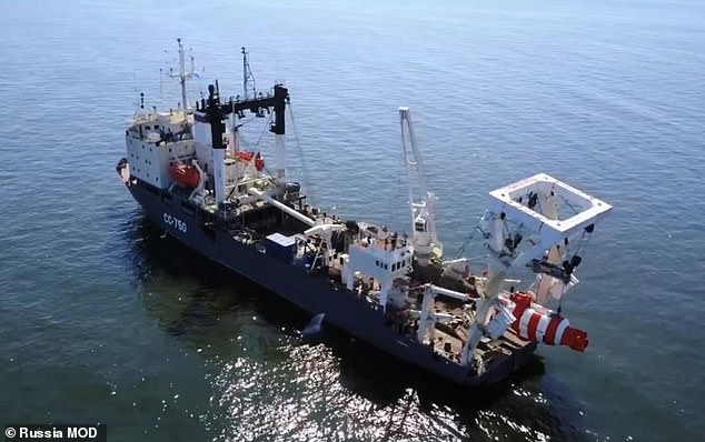 The newspaper said the submarine rescue ship SS-750 (file image) was photographed in the Baltic Sea four days before the still-unexplained explosions on the pipelines that link Russia to Germany