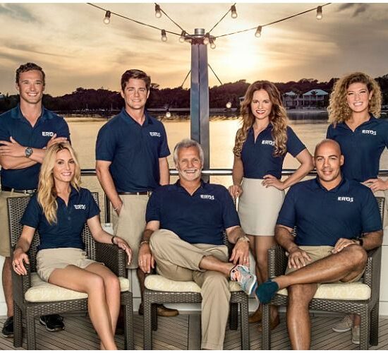 Below Deck Crew Pose in Blue Polos On Ship