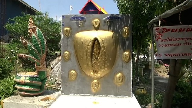 Footage shows the anatomically correct replica of the female genitalia engraved with prayers at a Buddhist shrine in the Nakhon Ratchasima province