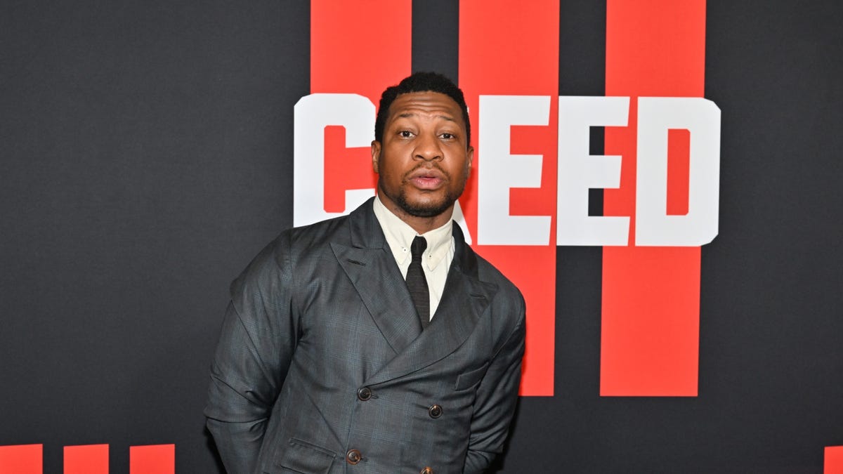Jonathan Majors appears in court as trial date set for August