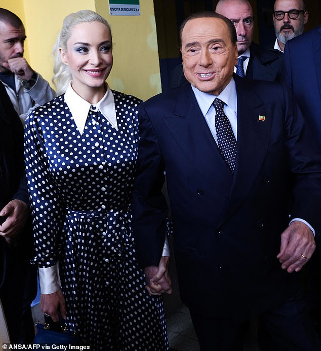 Italy 's controversial former Prime Minister Silvio Berlusconi has died aged 86 after being admitted to hospital with leukaemia last week. Pictured: Berlusconi and his 33-year-old partner Marta Fascina, who is a Forza Italia MP