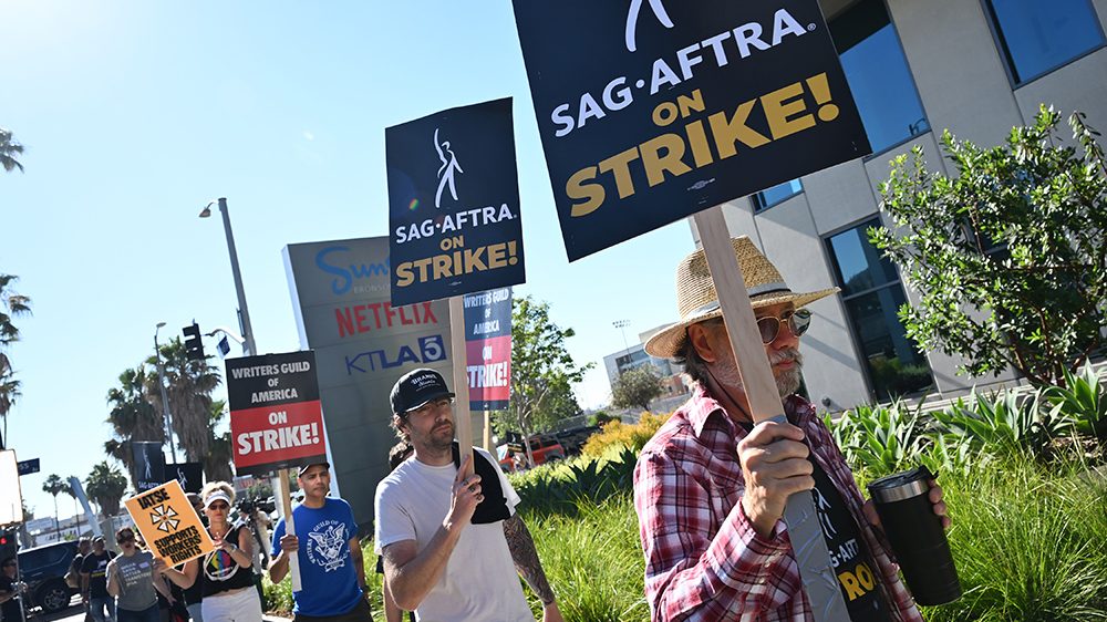 SAG-AFTRA and WGA Members and Supporters walks the picket line in support of the SAG-AFTRA and WGA strike at the Netflix Studios on July 14, 2023 in Los Angeles, California.