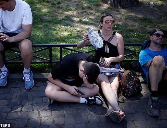 British visitors sought refuge in the shaded areas in the Italian capital yesterday