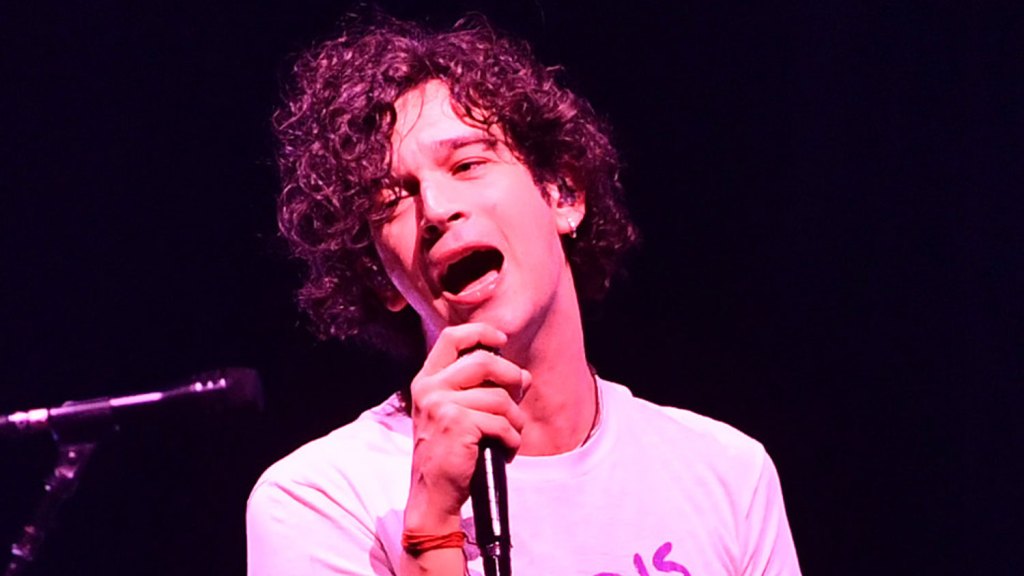 Matty Healy Shares Kiss With Male Bandmate In Protest Of Malaysian Anti-LGBTQ Laws; Government Cancels Music Festival – Deadline