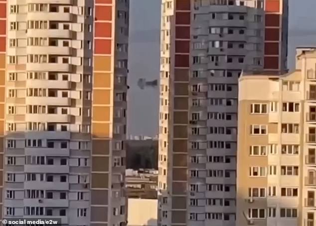 A video purportedly shows a drone going up in smoke as it is brought down near residential buildings outside of Moscow