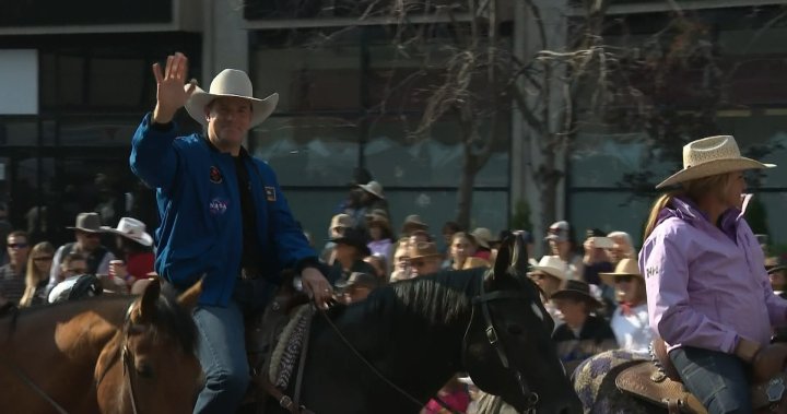 ‘Don’t fall off the horse’: Astronaut Jeremy Hansen leads Calgary Stampede parade