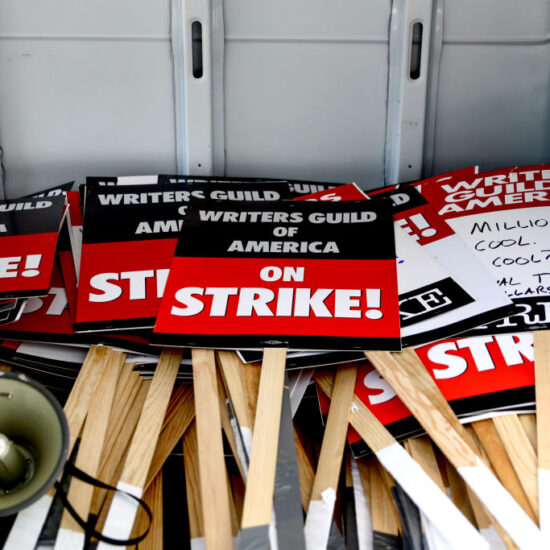 Writers' strike: Hollywood scribes picket studios for better pay. 'It's not sustainable'