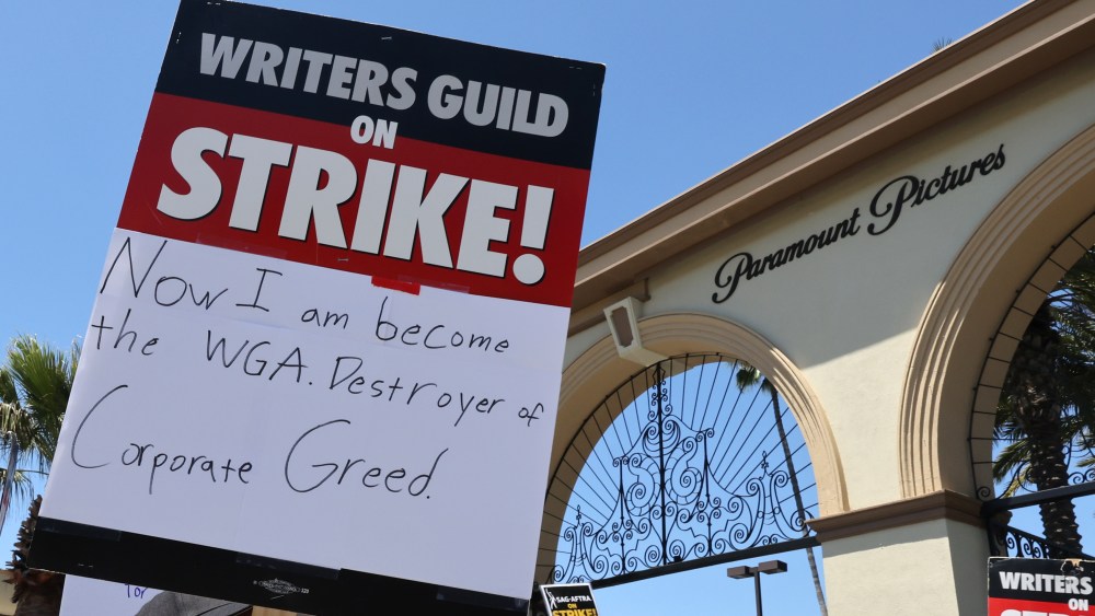 LOS ANGELES - AUGUST 03: Signage used by members and supporters of SAG-AFTRA and WGA as they walk the picket line is seen at Paramount Studios on August 03, 2023 in Los Angeles, California. Members of SAG-AFTRA and WGA (Writers Guild of America) have both walked out in their first joint strike against the studios since 1960. The strike has shut down a majority of Hollywood productions with writers in the third month of their strike against the Hollywood studios. (Photo by David Livingston/Getty Images)