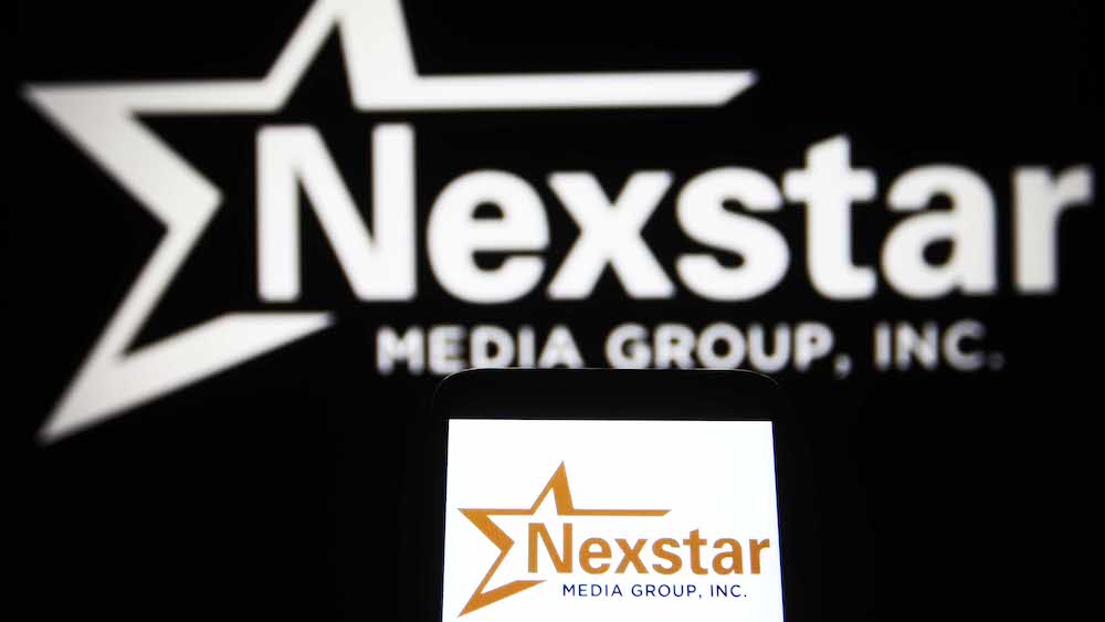 UKRAINE - 2021/08/17: In this photo illustration, Nexstar Media Group, Inc. logo is seen on a smartphone and a pc screen. (Photo Illustration by Pavlo Gonchar/SOPA Images/LightRocket via Getty Images)