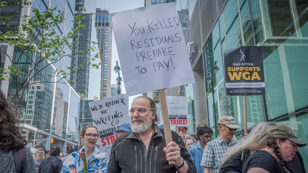MANHATTAN, NEW YORK, UNITED STATES - 2023/05/10: Actor Mandy Patinkin seen marching in solidarity with the WGA. The 2023 Writers Guild of America strike is an ongoing labor dispute between the Writers Guild of America (WGA) labor union and the Alliance of Motion Picture and Television Producers (AMPTP).The WGA represents 11,500 screenwriters and went on strike on Tuesday after contract negotiations with studios, streaming services and networks failed. (Photo by Erik McGregor/LightRocket via Getty Images)