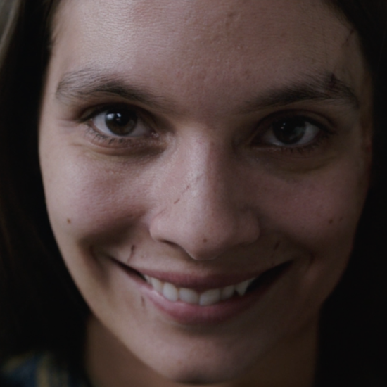 Caitlin Stasey as Laura Weaver smile death Smile 2022 movie