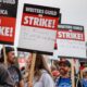WGA, studios bargain for third straight day. Writers hit picket lines in droves
