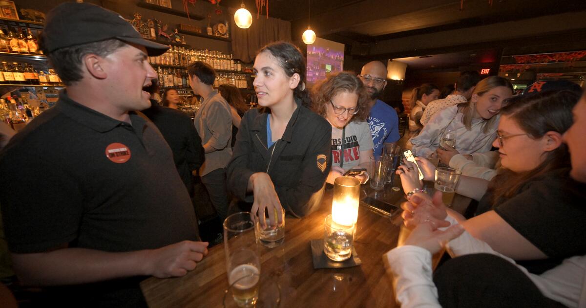 Writers rejoice over drinks while celebrating WGA deal at L.A. bars