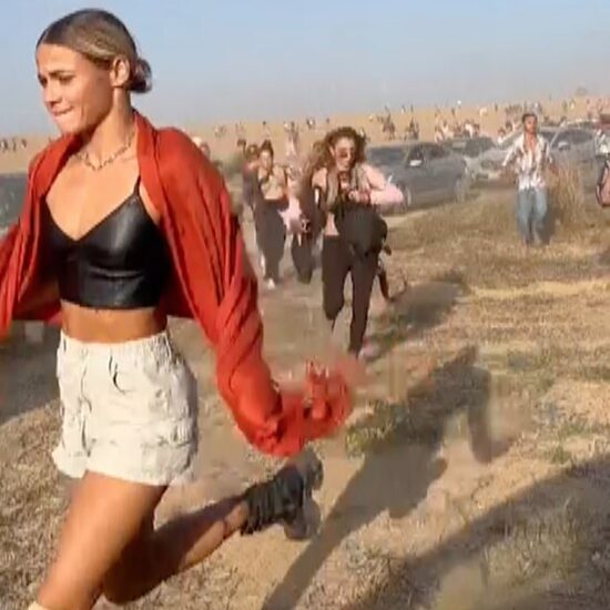 Vlada Patapov (left) is seen in a now-iconic picture fleeing the site of the Nova festival massacre on October 7, where Hamas gunmen opened fire on revellers, killing hundreds