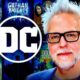 James Gunn, DC logo, DC TV posters in backgorund