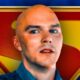 Lex Luthor, played by Nicholas Hoult, Superman movie symbol in background