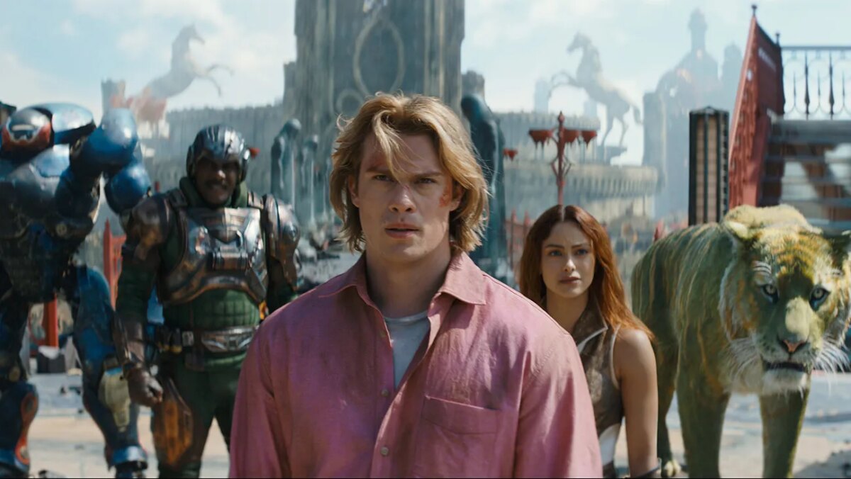 (l-r): Roboto (Kristen Wiig), Man At Arms (Idris Elba), Adam (Nicholas Galitzine), Teela (Camila Mendes) and Cringer in Masters of the Universe.