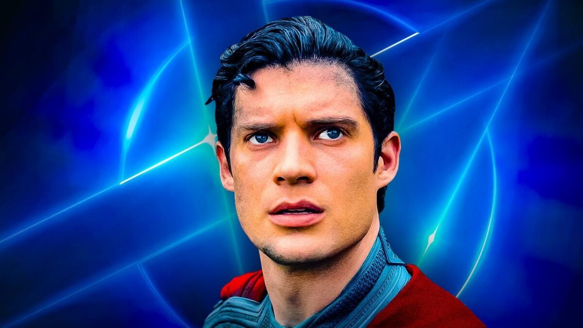 David Corenswet as Superman with glowing logo in background