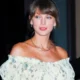 Taylor Swift Proves Every Breezy Floral Dress Needs a Raffia Bag This Summer