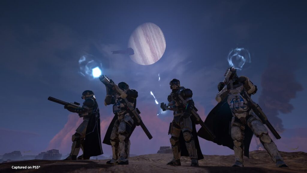 The players carrying Control Group items in Helldivers 2.