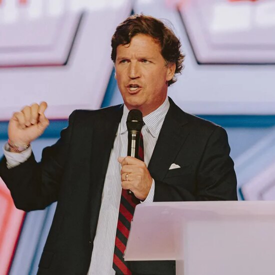 Conservative political commentator and podcast host Tucker Carlson speaks at Turning Point