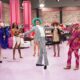 RuPaul (center) on RuPaul’s Drag Race season eight, for which he earned the first of eight consecutive reality host Emmy awards. THR announced the launch of the show in 2008.