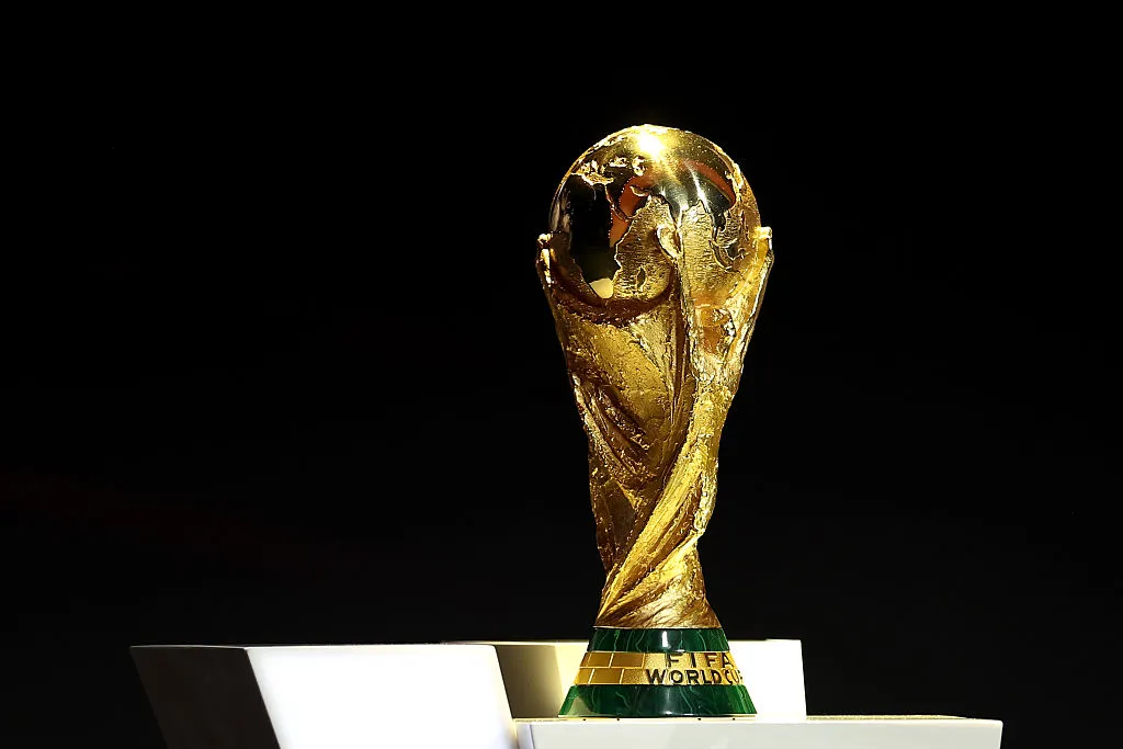 WASHINGTON, DC - DECEMBER 05: The FIFA World Cup Trophy is displayed on stage during the FIFA World Cup 2026 Official Draw at John F. Kennedy Center for the Performing Arts on December 05, 2025 in Washington, DC. (Photo by Michael Regan - FIFA/FIFA via Getty Images)