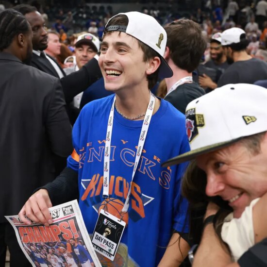 Timothée Chalamet celebrating as the New York Knicks win the 2026 NBA Finals.