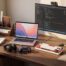 A home office desk setup with tech peripherals and accessories