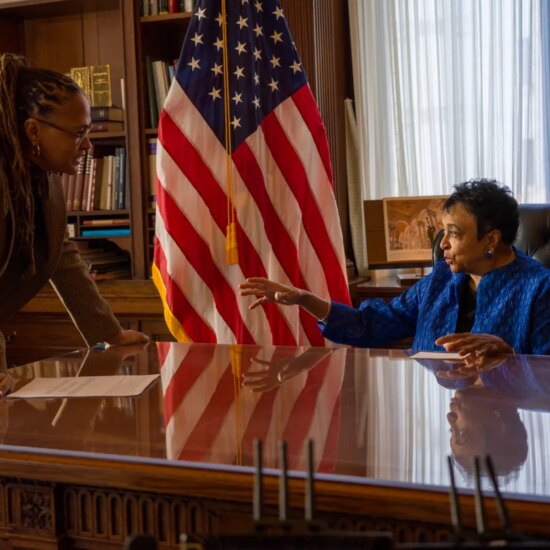 Ava DuVernay with sitting Librarian of Congress Carla Hayden while making 