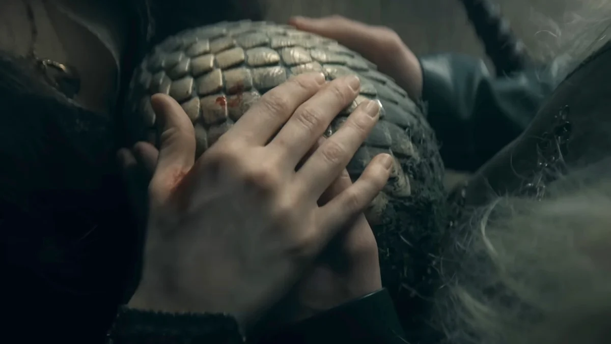 Hands holding a dragon egg on House of the Dragon