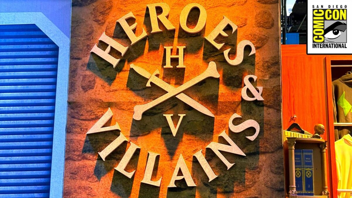 Heroes & Villains booth and logo at San Diego Comic-Con with Comic-Con logo in top right corner.