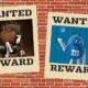 Two wanted signs hang on a brick wall, displaying photos of the brown and blue m&ms characters.