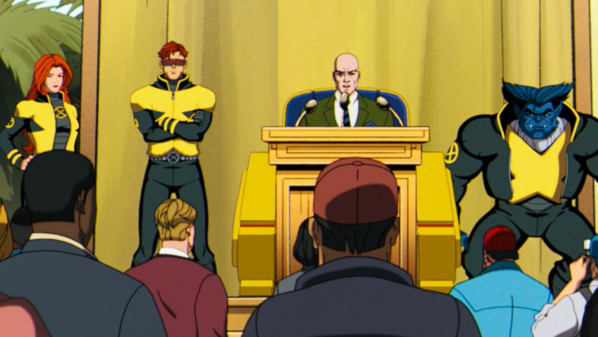 Jean Grey, Cyclops, Professor X, and Beast at a press conference.