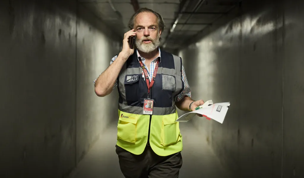 Netflix Boards 'The Airport Chaplain' Starring Hugo Weaving