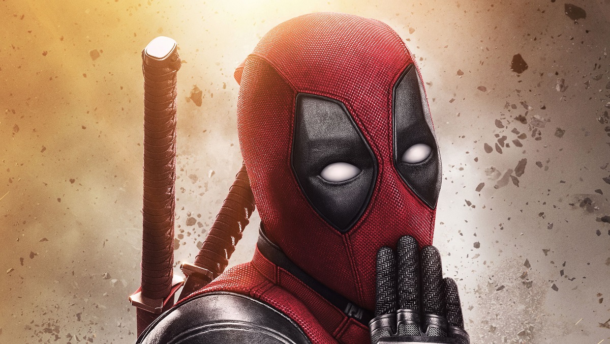 Deadpool with his hand over his mouth