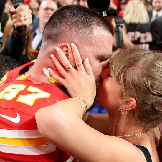 Travis Kelce #87 of the Kansas City Chiefs kisses Taylor Swift after defeating the San Francisco 49ers 25-22 in overtime during Super Bowl LVIII at Allegiant Stadium on February 11, 2024 in Las Vegas, Nevada.