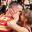 Travis Kelce #87 of the Kansas City Chiefs kisses Taylor Swift after defeating the San Francisco 49ers 25-22 in overtime during Super Bowl LVIII at Allegiant Stadium on February 11, 2024 in Las Vegas, Nevada.