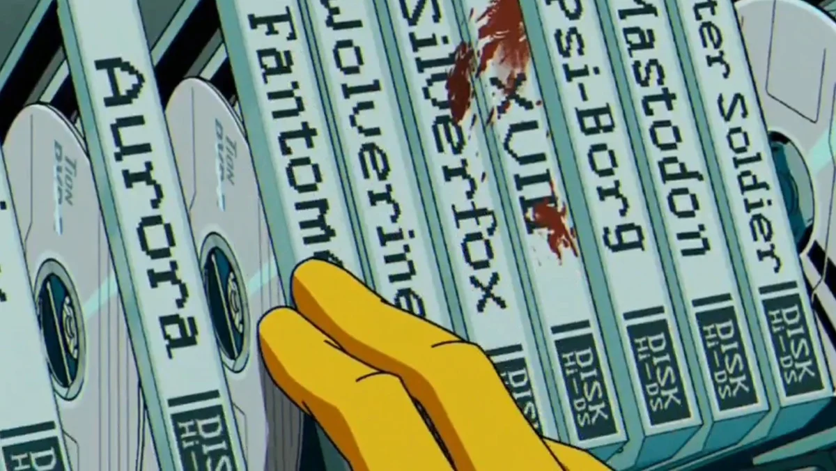 Morph looks at mysterious DVDs in the Weapon X base.