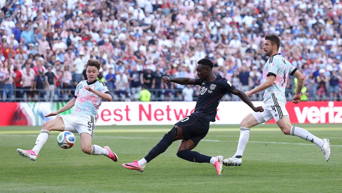 Folarin Balogun #20 of the United States shoots and misses a chance against Maxim De Cuyper #5 and Brandon Mechele #4 of Belgium during the FIFA World Cup 2026 Round of 16 match between USA and Belgium at Seattle Stadium on July 06, 2026 in Seattle, Washington.