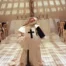 Sister Jeanne (Vanessa Redgrave) kneels amid other nuns and a crucifix in Ken Russell