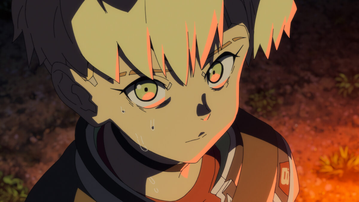&Quot;Anime Character With Blond And Dark Hair, Intense Green Eyes, And Sweat On Their Face, Looking Up With A Serious Expression In An Outdoor Nighttime Setting With Orange Lighting And Plants In The Background.&Quot;