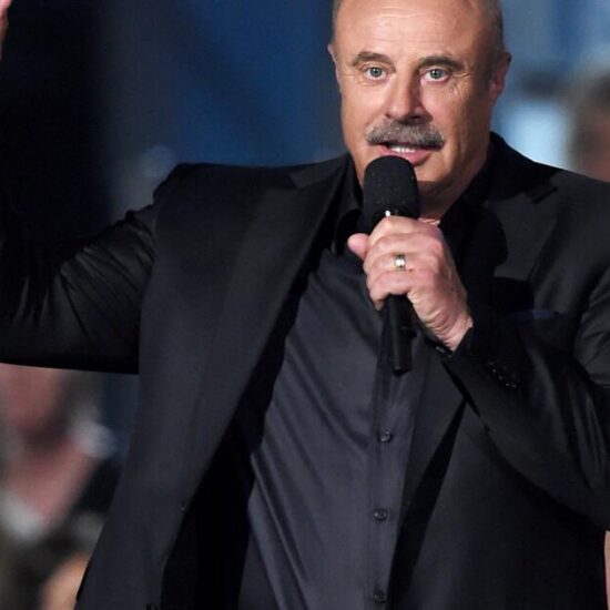 Dr. Phil's longtime publicist is suing him over claims of wrongful termination and discrimination