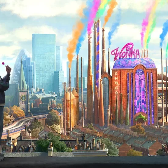A kid in the foreground eats a lollipop with the colorful Wonka factory with colorful smokestacks dominates a London cityscape in Charlie Vs. The Chocolate Factory