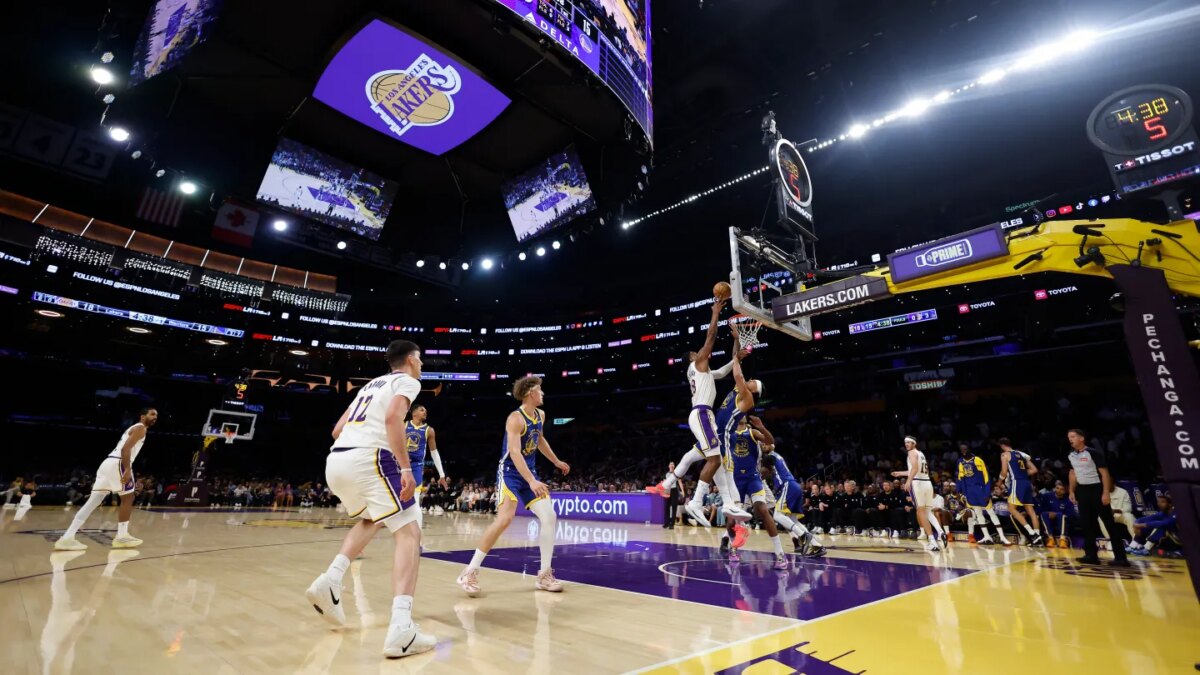 The Los Angeles Lakers face off against the Golden State Warriors in the first half at Crypto.com Arena on Oct. 12, 2025.