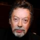 Luke Evans, 'Clue' Stars, Josh Gad & More Pay Tribute To Tim Curry