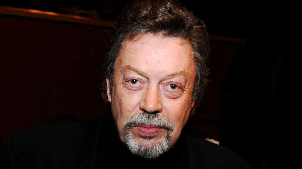 Luke Evans, 'Clue' Stars, Josh Gad & More Pay Tribute To Tim Curry