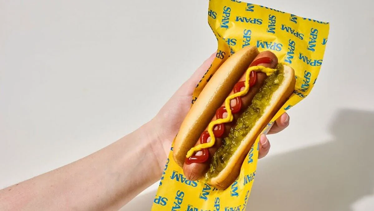 Photo of a SPAM hot dog in a bun.